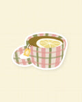 Sticker Thé au citron : tasse de thé fumante illustrée, finition brillante