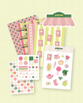 Le Kit Pépine : les trois planches de stickers et les quatre fonds papier du kit de scrapbooking
