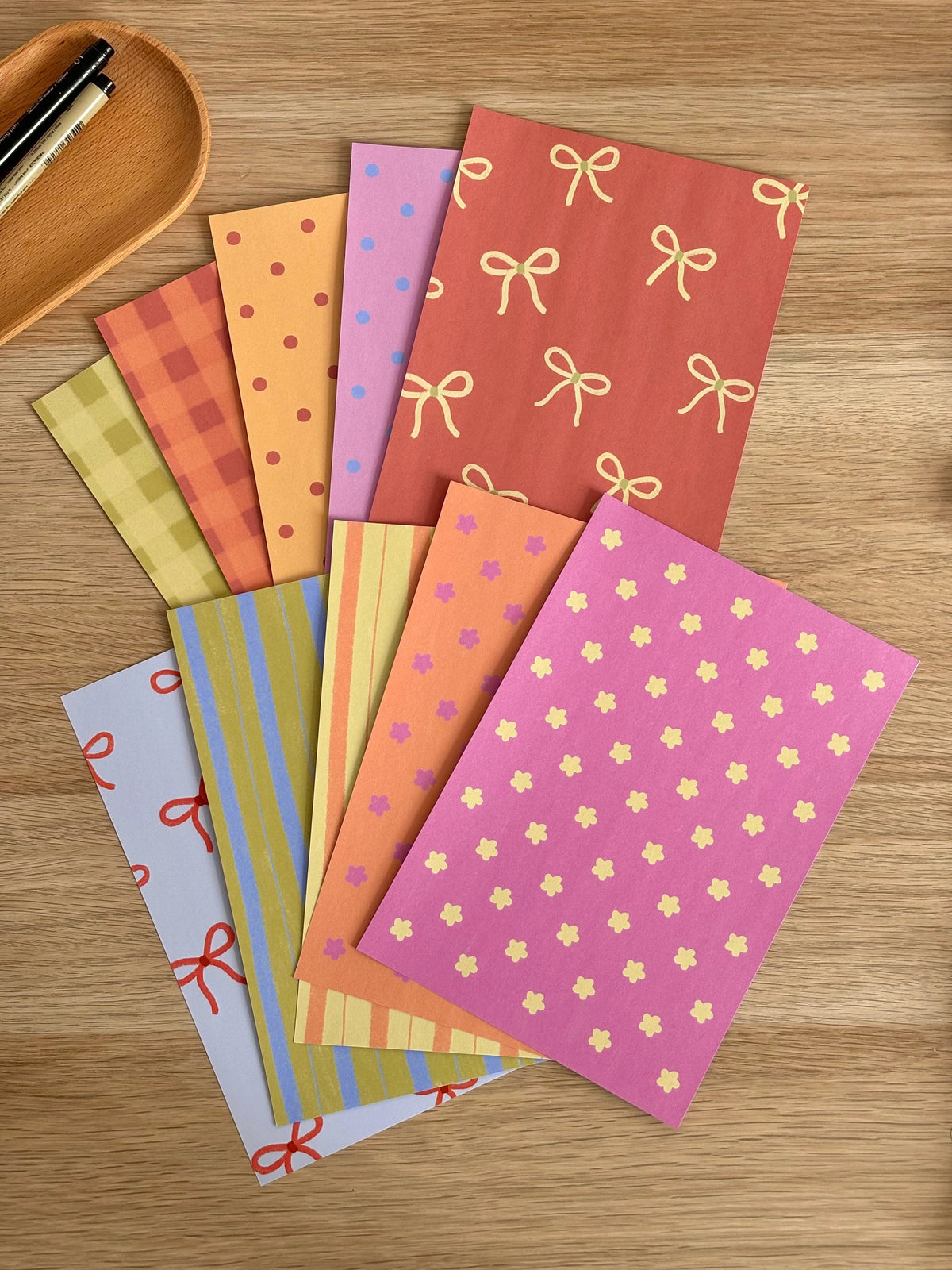 Fonds de scrapbooking Pépine photographiés en pile, format A5
