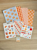 Le kit La boulangerie déballé à plat : fonds vichy, planches de stickers et sticker à l'unité