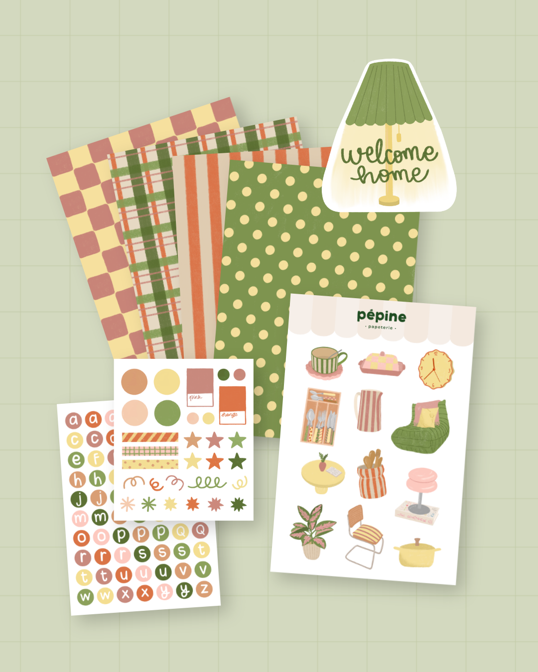 Kit de scrapbooking Décoration d'intérieur : les trois planches de stickers, les quatre fonds papier et le sticker welcome home